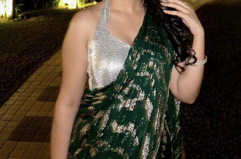 Emerald sequin saree with a silver halter blouse