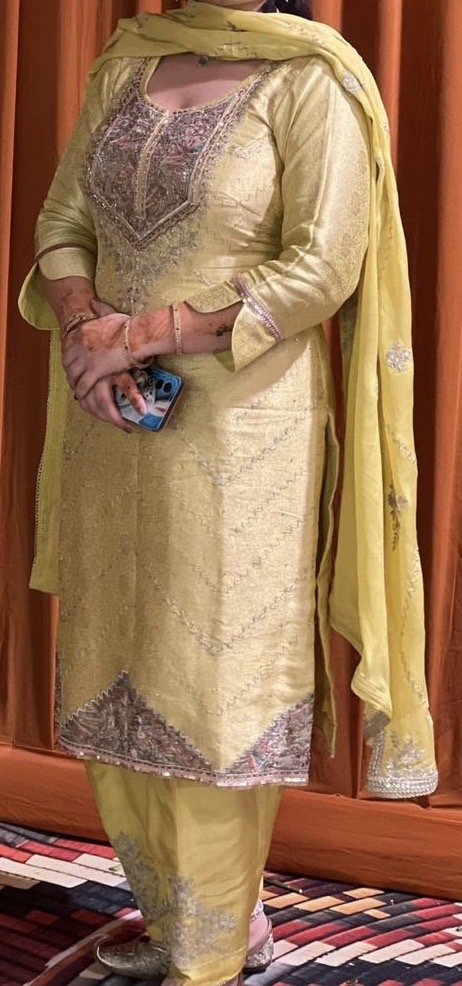 Lemon-yellow embroidered kameez with sequin yoke and matching pants