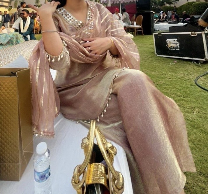 Blush-pink tissue kameez with pearl details and a sheer dupatta