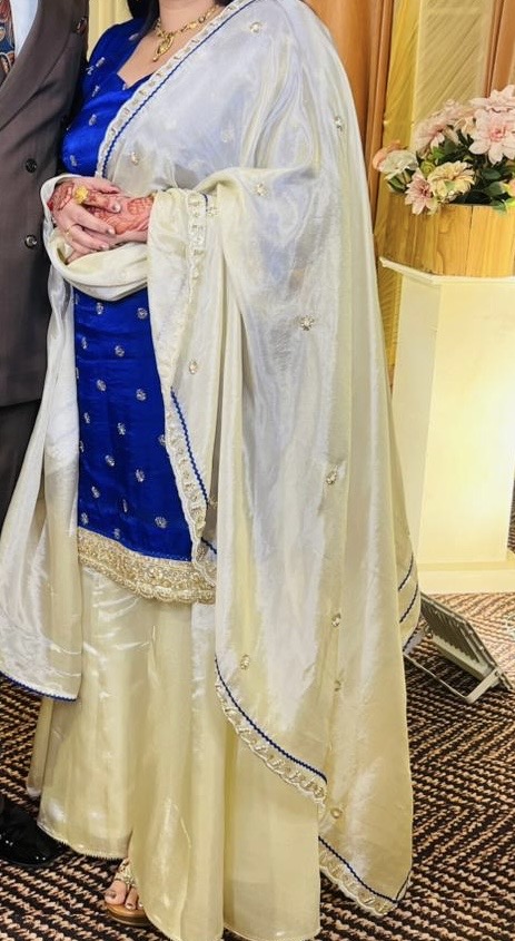 Royal blue kameez with a cream gharara and embroidered dupatta